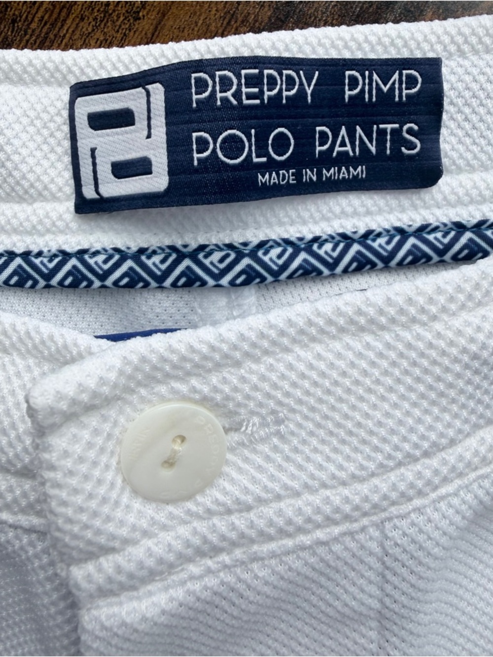 “Preppy Pimp Polo Pants” shorts with “Aaargh” on back pocket.  Made in Miami.